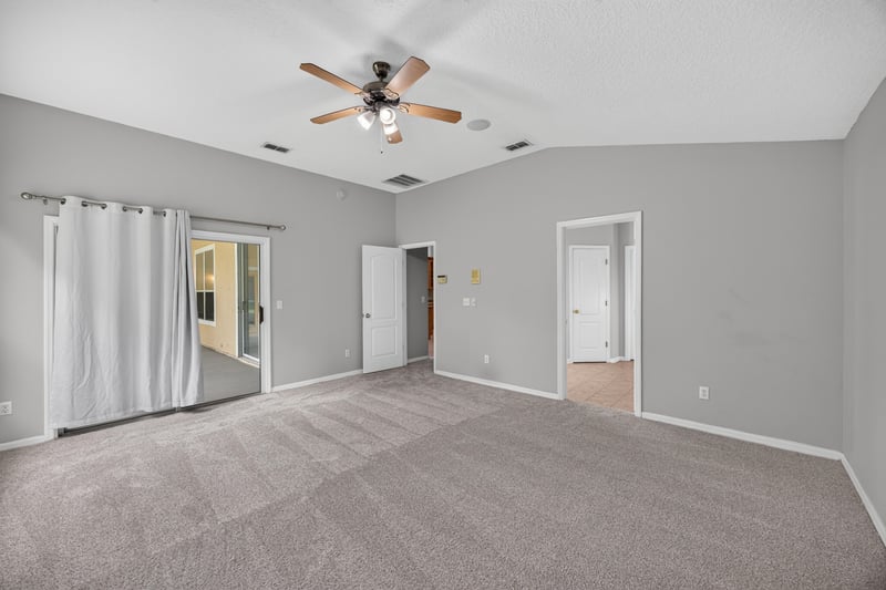 Bedroom with carpet and curtains at 635 Wakeview Dr, Orange Park, FL 32065