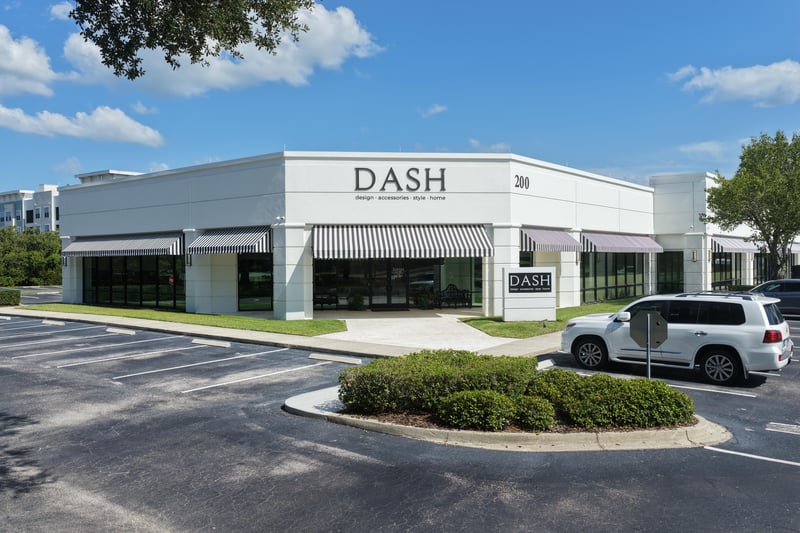 DASH building storefront with parked vehicle at 10550 Deerwood Park Blvd, Jacksonville, FL 32256