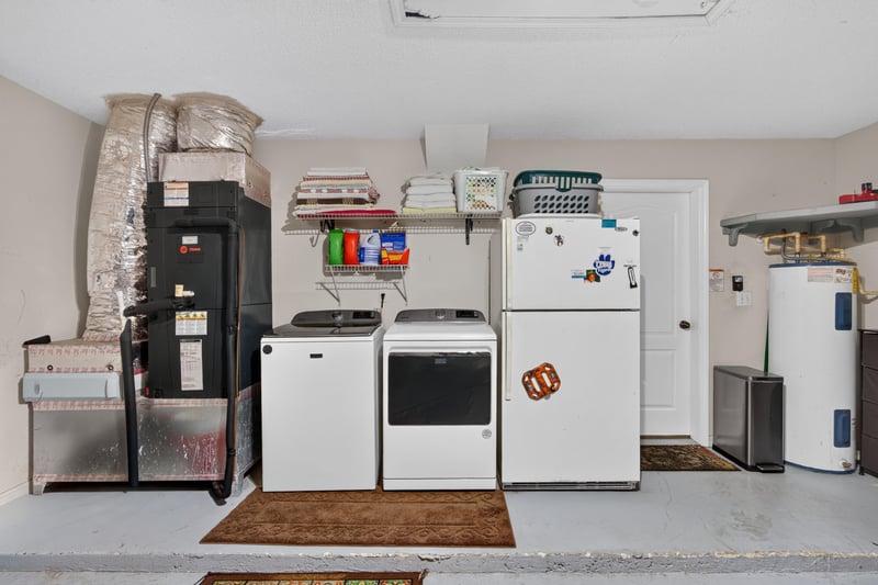 Laundry room with washer and dryer at 1589 Backwater Drive, Middleburg, FL 32068