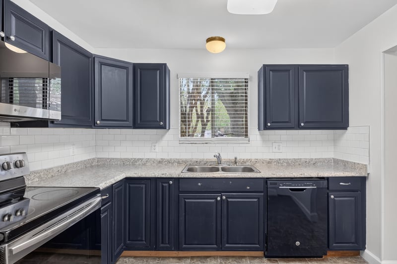 Kitchen with dishwasher and window above sink at 3801 Crown Point Rd unit 2061, Jacksonville, FL 32257
