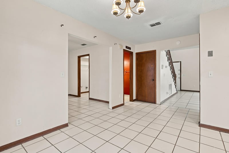 Hallway with chandelier and doors, photographed by Megapixeler on Blue Teal Ct, Jacksonville