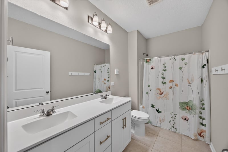 Bathroom with vanity and toilet at 75875 Saffron Ln, Yulee, FL 32097
