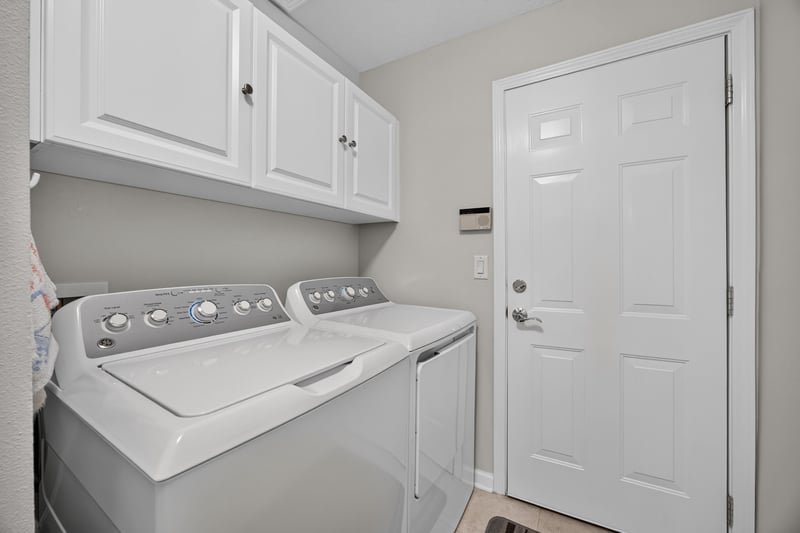 Laundry room with washer and dryer at 11225 Water Spring Cir, Jacksonville, FL 32256