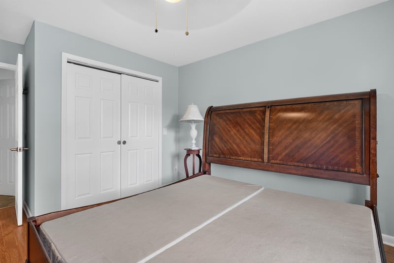 Bedroom with bed and closet doors at 5745 110th St, Jacksonville, FL 32244
