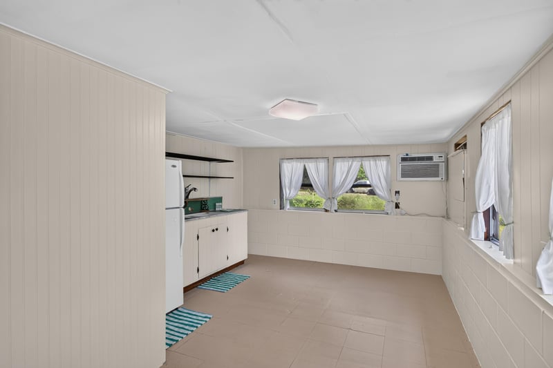 Interior of outbuilding with windows at 101 N Lake St, Crescent City, FL