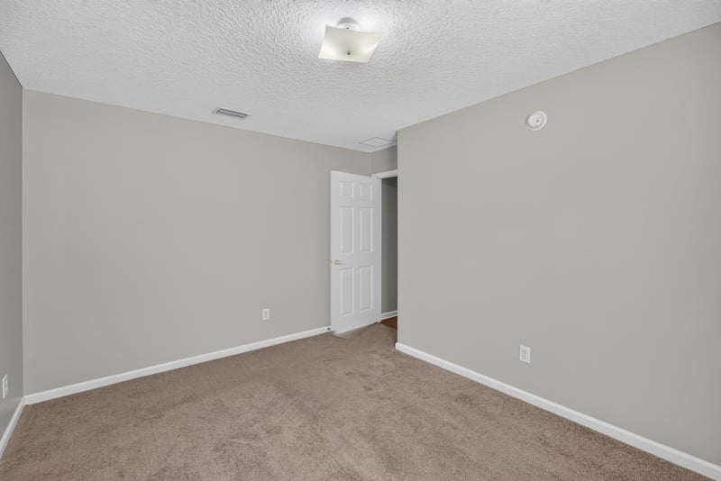 Carpeted bedroom at 14147 Fish Eagle Dr E, Jacksonville, FL 32226