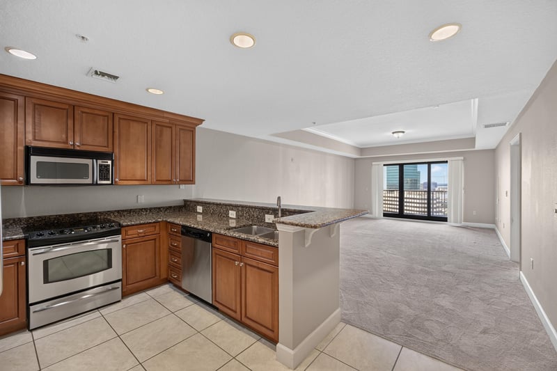 Kitchen open to living room at 1478 Riverplace Blvd 1904, Jacksonville, FL 32207