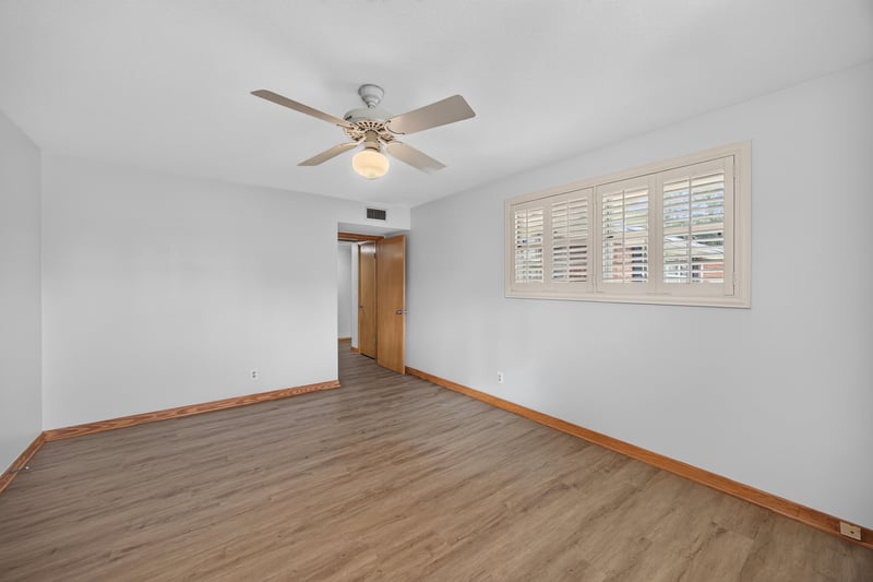 Empty bedroom with ceiling fan and window at 1834 Memory Ln, Jacksonville, FL
