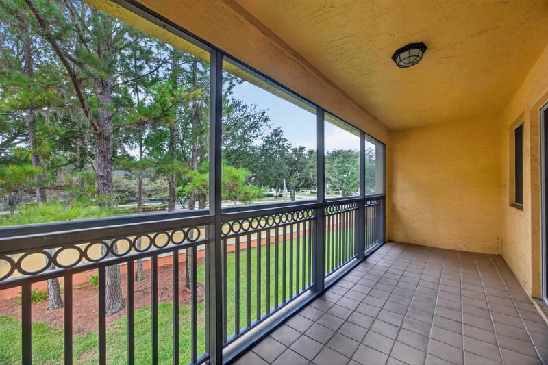 Laundry area with white washer and dryer at 9745 Touchton Rd, Jacksonville, FL 32246