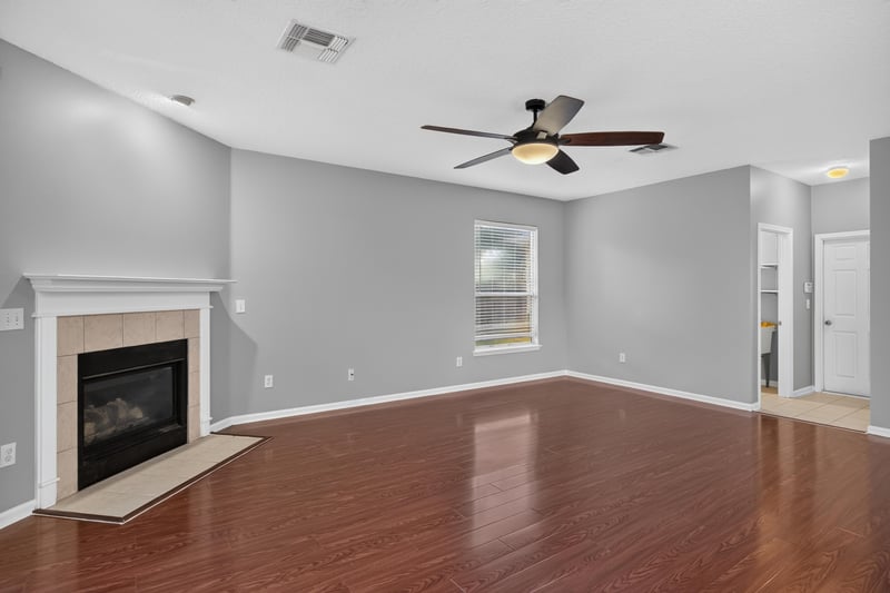 Family room with fireplace, open layout at 470 Sparrow Branch Cir, Jacksonville, FL 32259
