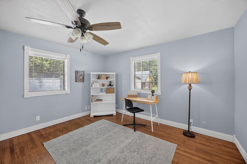 Bedroom used as office with bookshelves and desk at 5843 Ovella Rd, Jacksonville, FL 32244