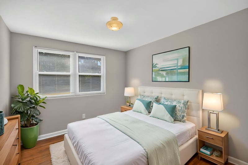Bedroom with windows and hardwood floors at 6338 Mercer Cir W, Jacksonville, FL