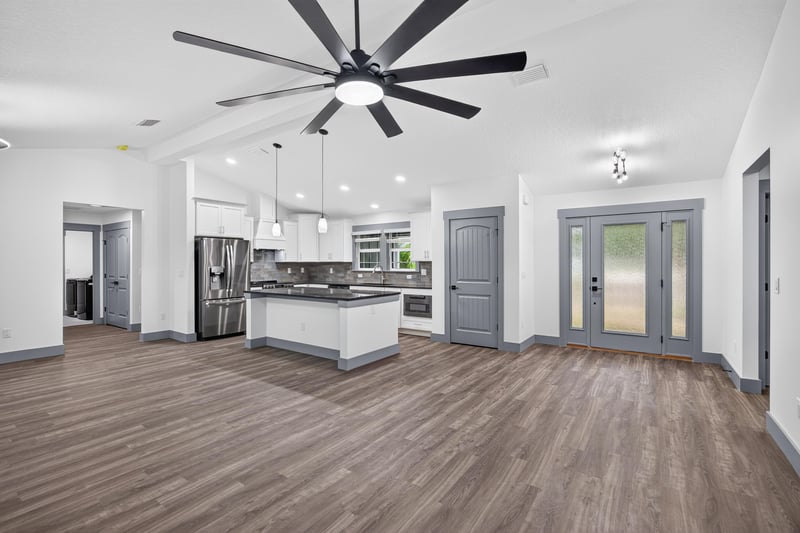 Kitchen view toward glass exterior doors at 4800 Acacia St, Middleburg, FL 32068