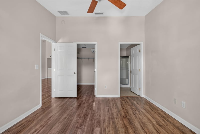 Bedroom with two closets and hallway view at 7047 Deer Lodge Cir, Jacksonville