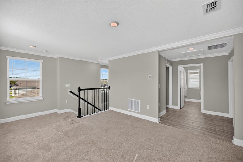 Hallway with staircase railing at 331 Millerstone Dr, St. Augustine, FL 32092