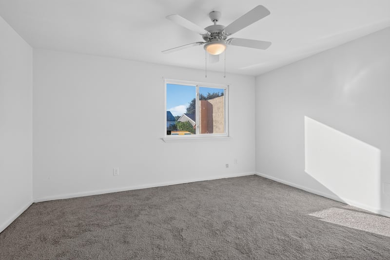 Carpeted bedroom with window, unfurnished at 8177 Virgo St, Jacksonville, FL 32216