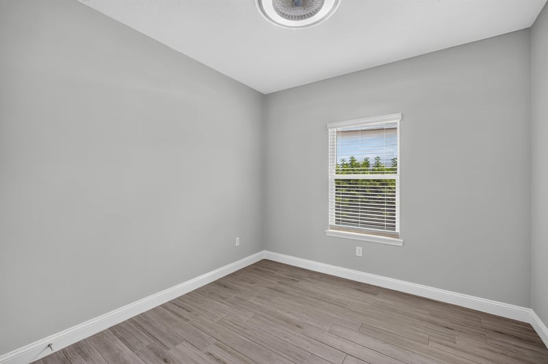 Bedroom with wood-look floors at 91 Tilloo Ct, St. Johns, FL