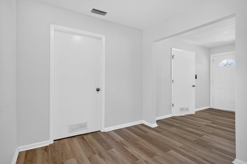 Hallway with multiple doors at 855 Cornwallis Dr, Jacksonville, FL