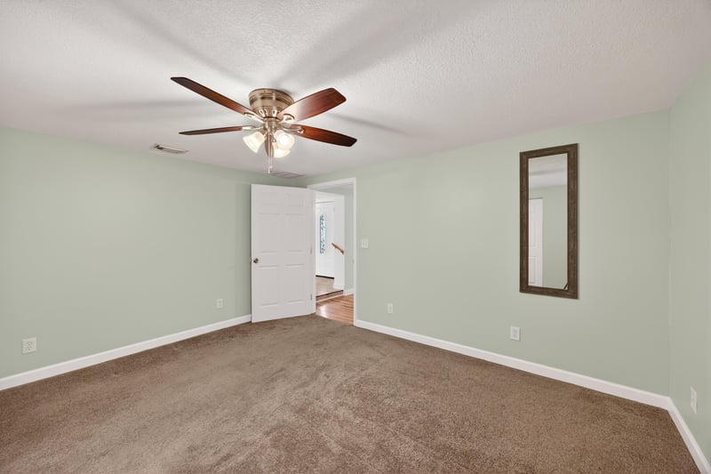 Empty room with carpet flooring and closet at 1619 Hammond Blvd, Jacksonville, FL