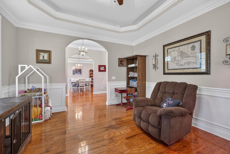 Foyer with recliner and arched doorways at 1735 Hagans Ridge Ct