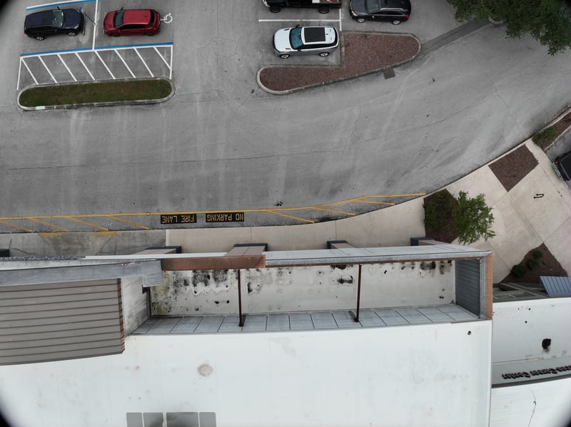 Aerial view of parking lot drive and landscaped curve at 9406 Atlantic Blvd, Jacksonville, FL 32225