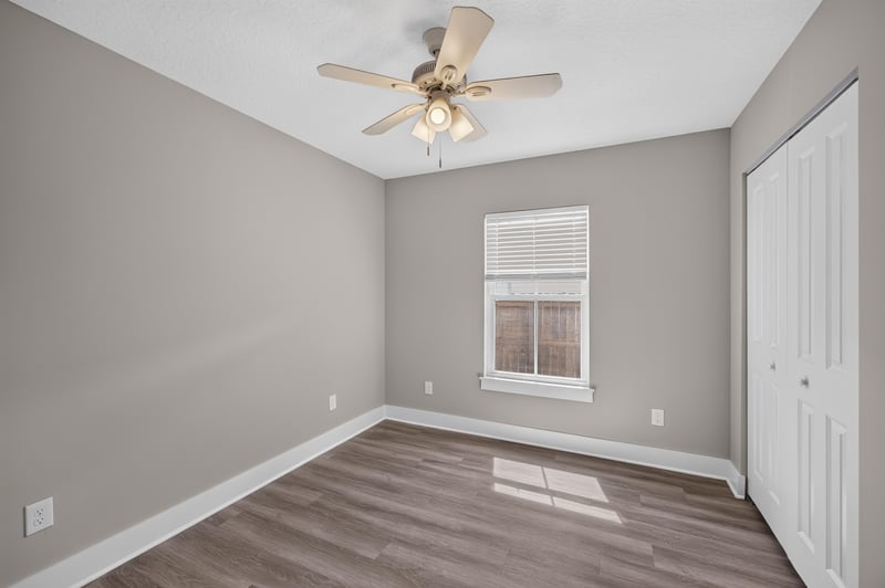 Empty bedroom with window and closet at 2855 N 8th St, St. Augustine, FL 32084