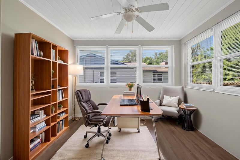 Room staged as a home office with bookshelf and desk at 6338 Mercer Cir W, Jacksonville, FL