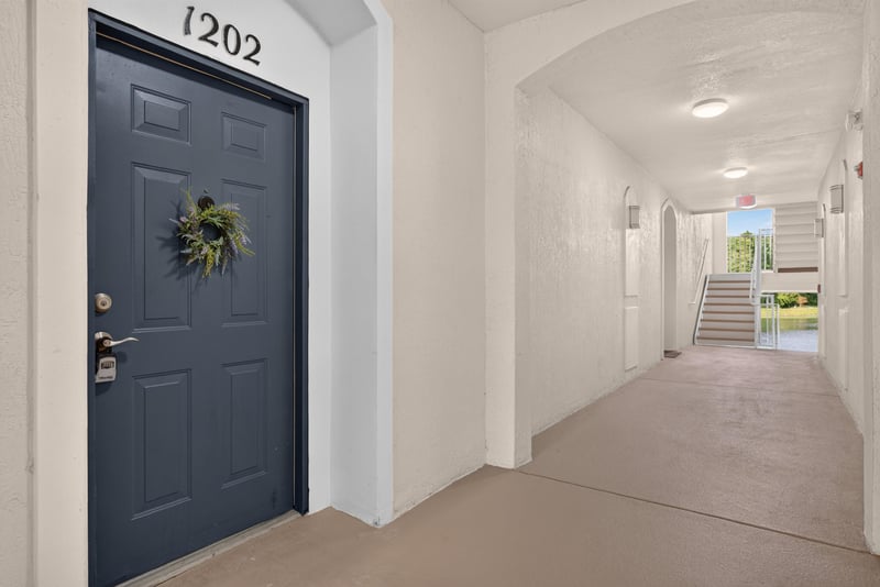 Front door of unit 1202 along the hallway at 11251 Campfield Dr unit 1202, Jacksonville, FL 32256