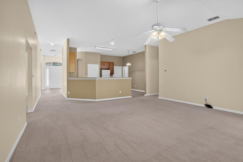 Kitchen and living area with breakfast bar at 299 John's Creek Pkwy, St. Augustine, FL 32092
