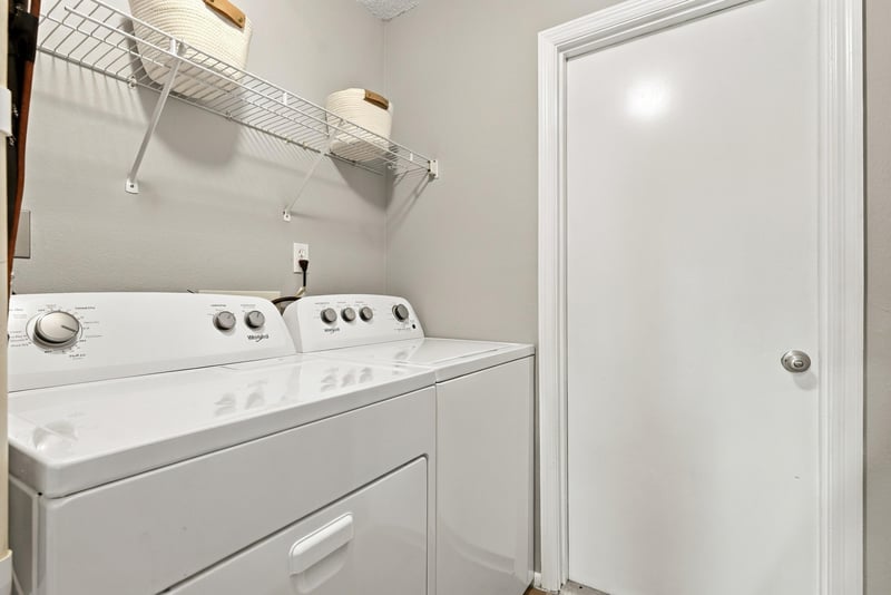 Laundry room with washer and dryer at 11197 Illford Dr