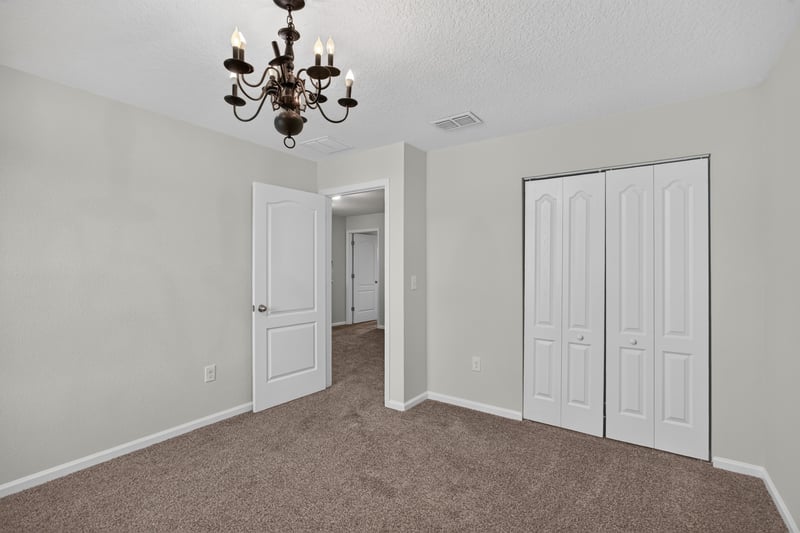 Bedroom with closet and carpet at 6830 Hanford St, Jacksonville, FL 32219