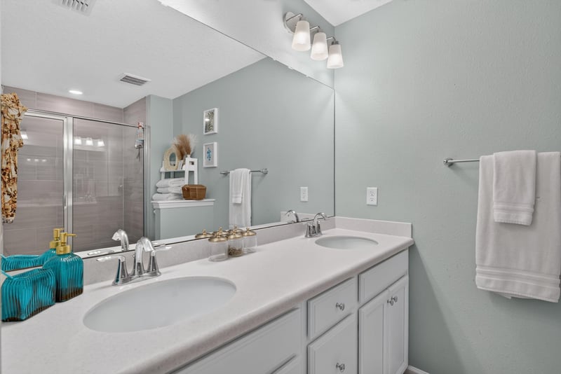 Primary bathroom double vanity at 1186 Beach Dune Dr, Jacksonville, FL 32233