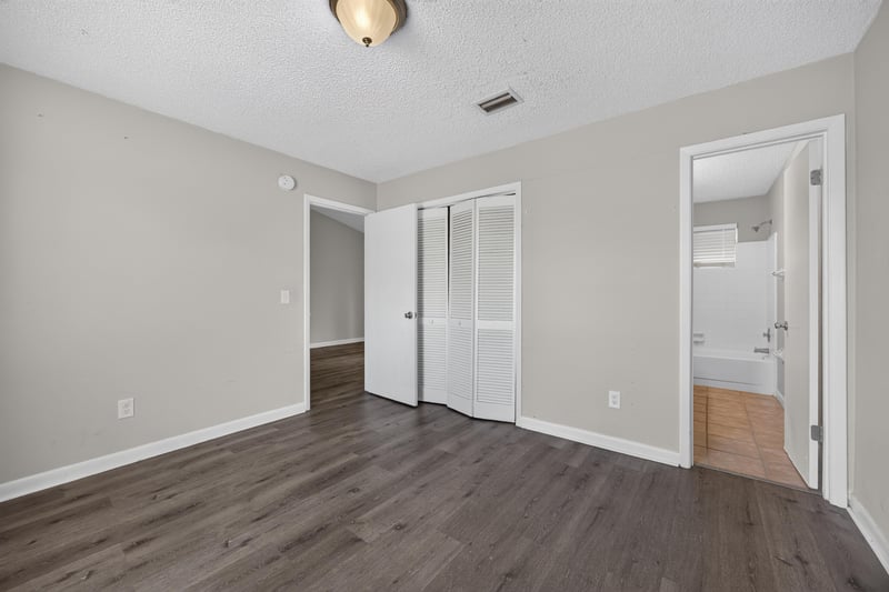 Hallway leading to closet and bathroom at 2719 Trollie Ln