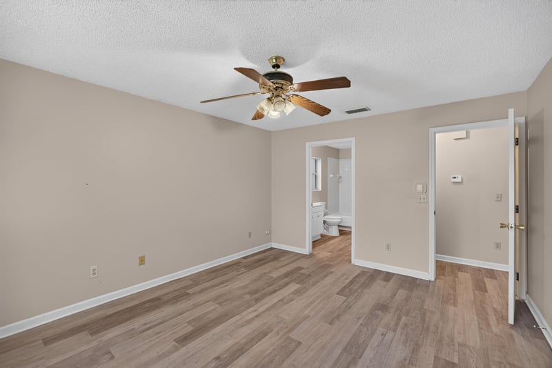 Hallway with doors to bath and bedrooms at 6646 Shiloh Creek Dr