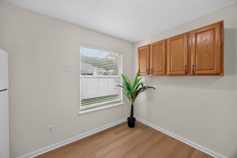 Kitchen corner cabinets near window at 605 N Covered Bridge Rd, Jacksonville, FL