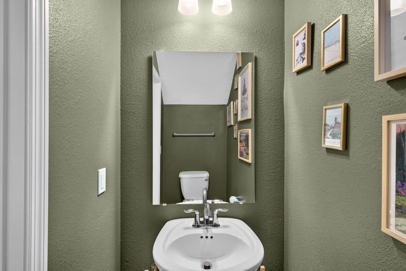 Powder room with pedestal sink at 1186 Beach Dune Dr, Jacksonville, FL 32233