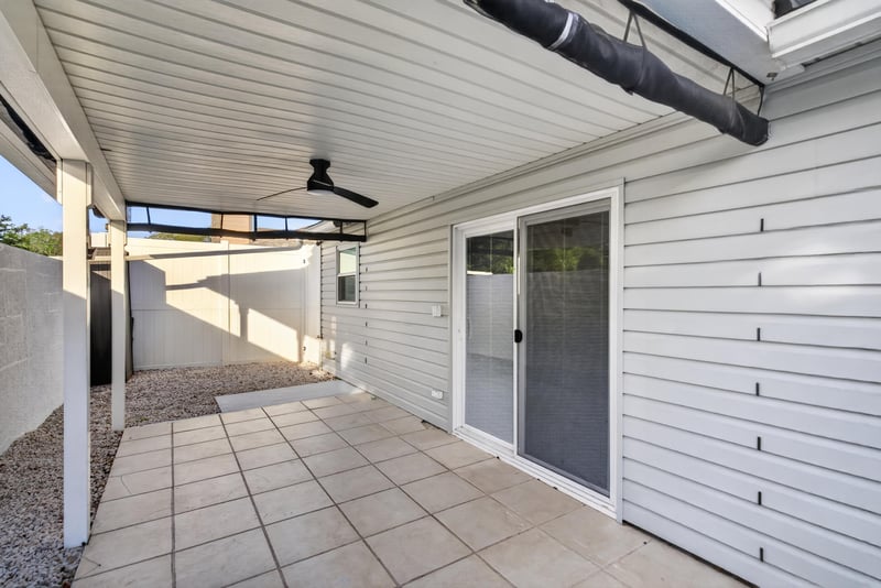 Covered patio view from the home, photographed by Megapixeler on Birch Run E, Orange Park