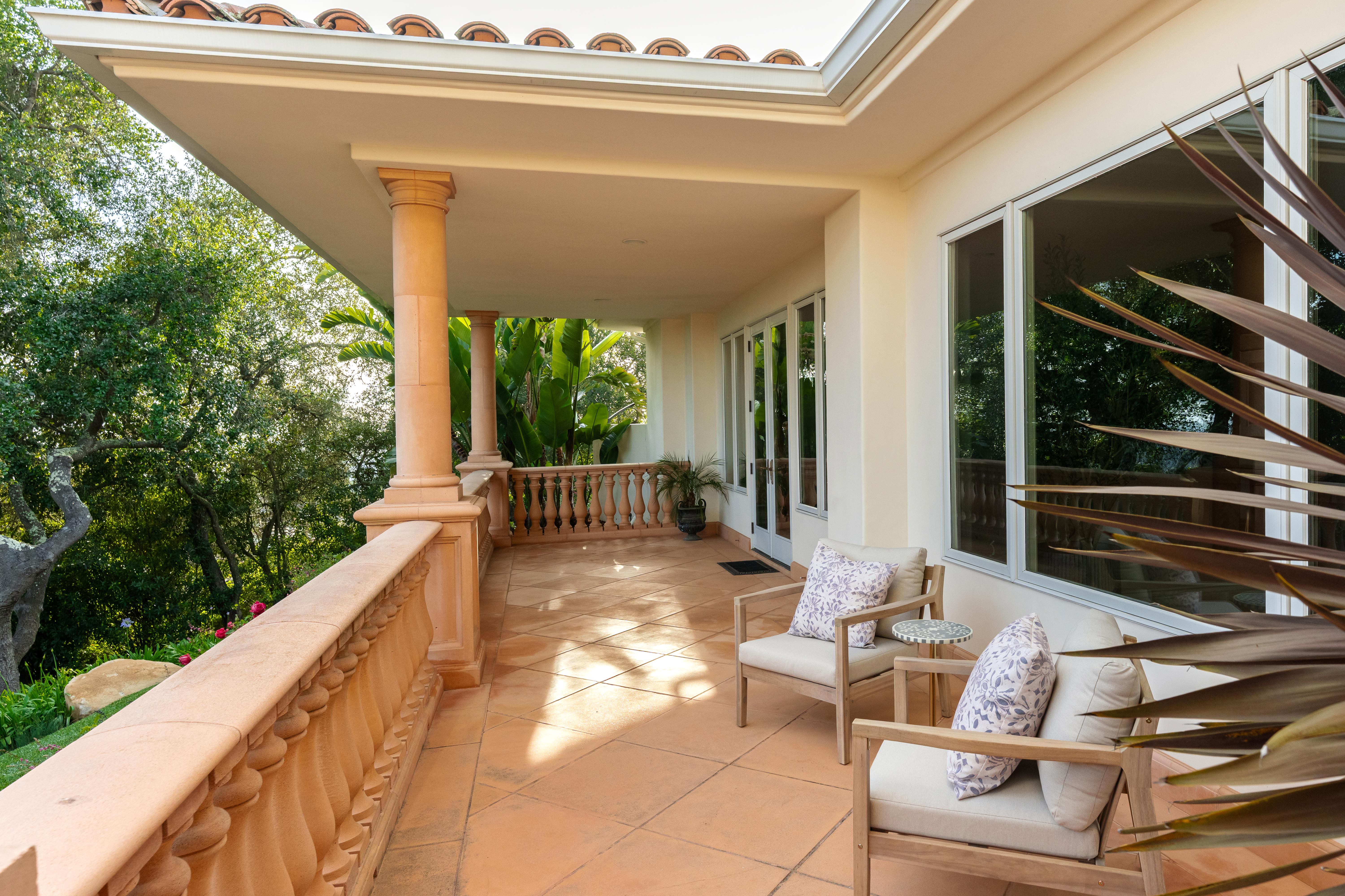 Twilight photography of estate exterior at 450 El Cielito Rd, Santa Barbara — virtual tour photography and twilight imaging capturing warm interior light against a violet Pacific sky above the American Riviera. Our team captured still photography, aerial drone photography, twilight photography, a Matterport virtual tour, a 2D floor plan, and a custom property website from afternoon through twilight.