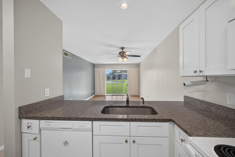 Kitchen sink with window view at 700 W Pope Rd unit h61, St. Augustine, FL 32080