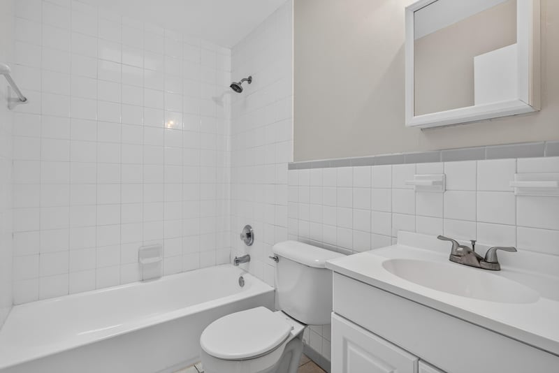 Bathroom with tub and vanity sink at 2618 Arlex Dr E, Jacksonville, FL