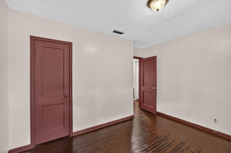 Hallway with red trim doors at 2132 Allandale Cir W, Jacksonville, FL