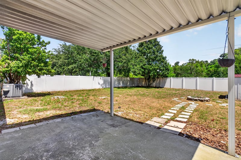 Covered patio and backyard at 224 Pine Arbor Cir, St. Augustine, FL 32084