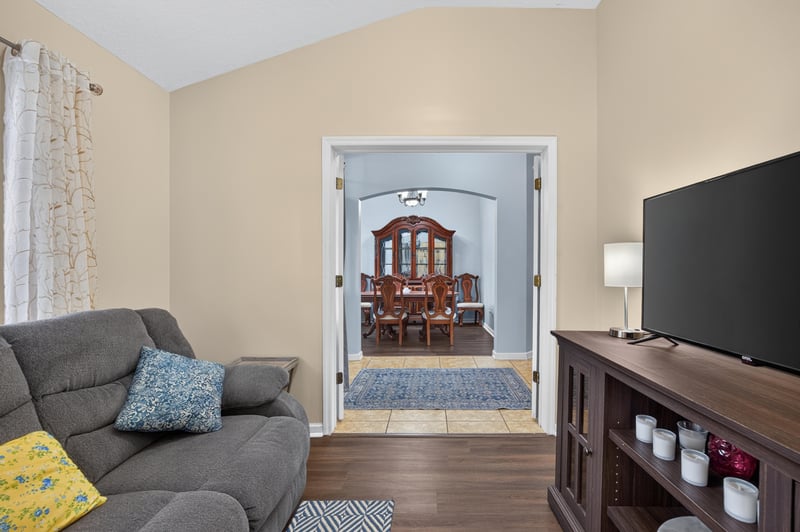 Living room opening to the dining room at 3112 Silverado Cir, Green Cove Springs, FL 32043
