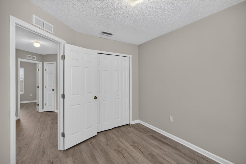 Bedroom closet and hallway entry at 8519 Blazing Star Ct, Jacksonville, FL 32210