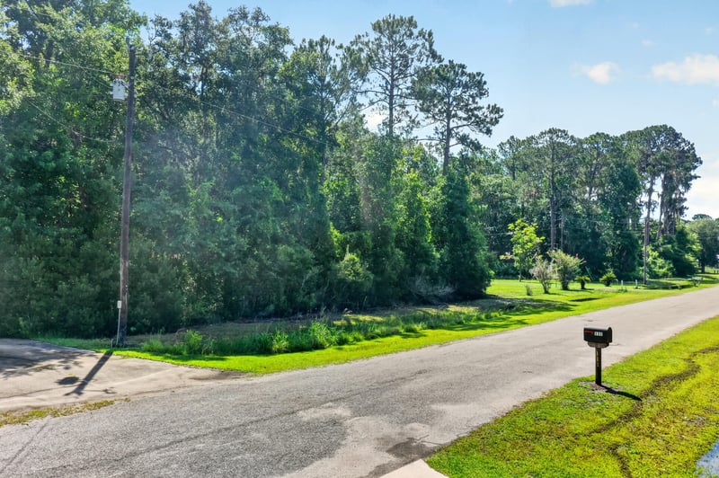 Low aerial view of the road and mailbox at 110 River Shores Rd, Palatka, FL 32043