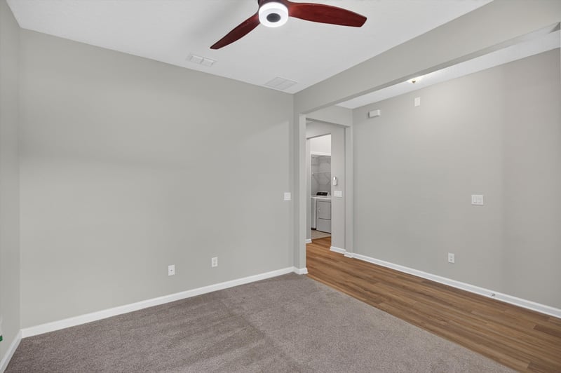 Hallway with carpet and ceiling fan at 75875 Saffron Ln, Yulee, FL 32097