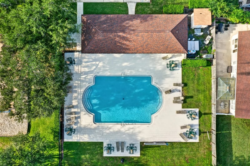 Aerial view of community pool and clubhouse in Johns Creek