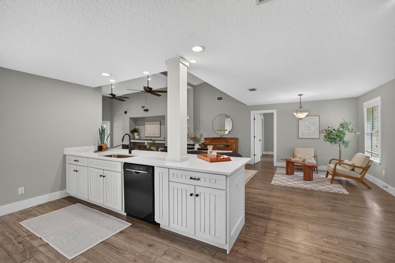 Kitchen island open to living room at 1161 Whispering Pines Rd, Jacksonville, FL 32259