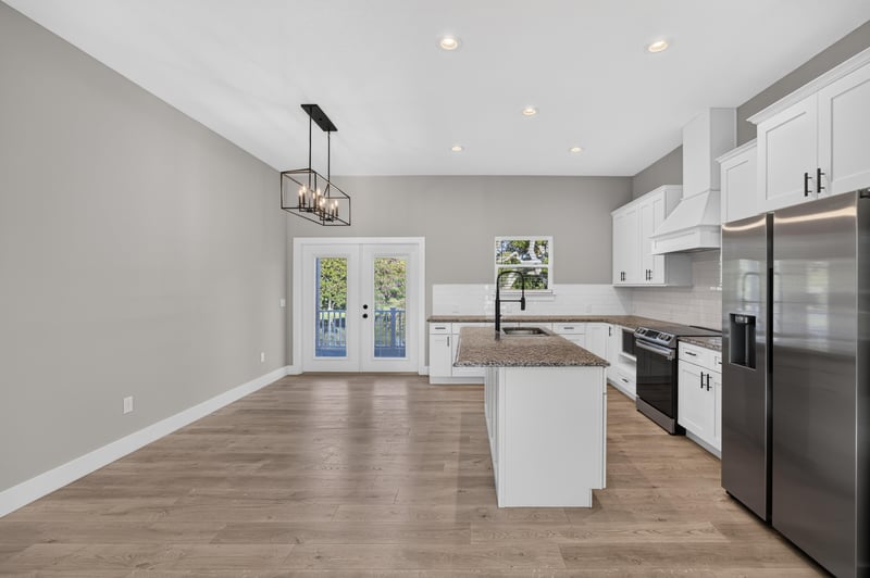 Kitchen with island and french doors at 175 Alava Ct