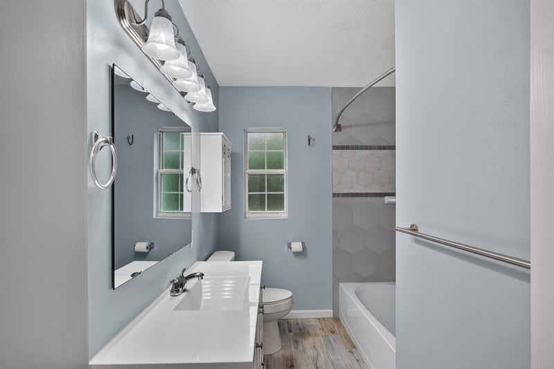 Bathroom, vanity mirror and tub-shower at 2256 Inwood Cir S, Jacksonville, FL